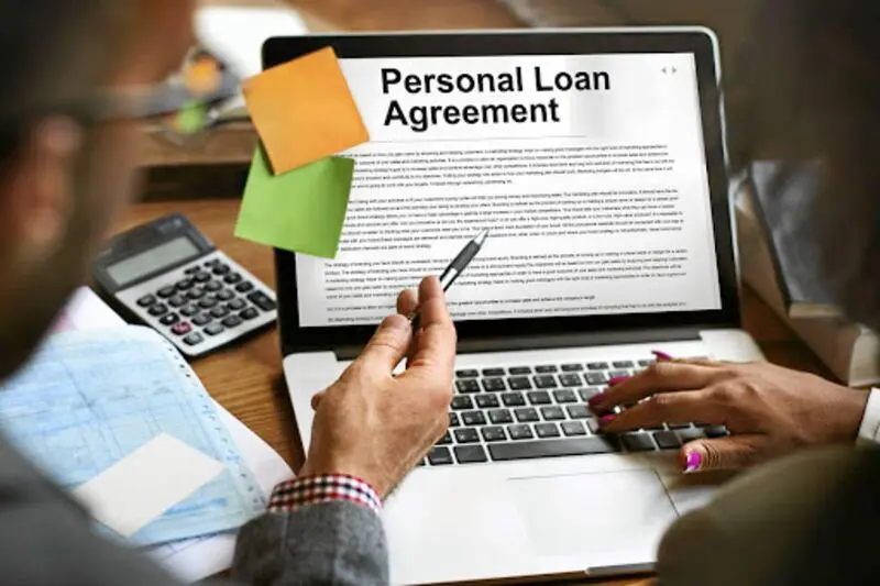 Borrower reviewing a loan and repayment terms